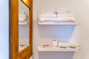 Postel nebo postele na pokoji v ubytování Blancos Rooms Hotel