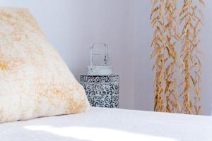 Postel nebo postele na pokoji v ubytování Blancos Rooms Hotel