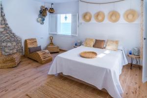 Postel nebo postele na pokoji v ubytování Blancos Rooms Hotel