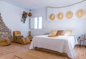 Postel nebo postele na pokoji v ubytování Blancos Rooms Hotel