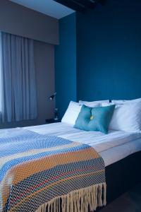 Cama o camas de una habitación en Hotel Marena
