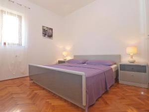 Postel nebo postele na pokoji v ubytování Apartments Mira 1293