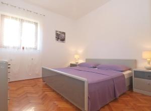 Postel nebo postele na pokoji v ubytování Apartments Mira 1293