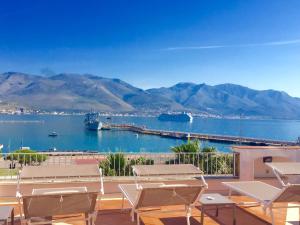a view of a large body of water with mountains at Hotel Gajeta in Gaeta