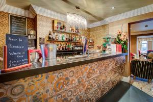 a bar in a restaurant with a counter at Number One South Beach in Blackpool