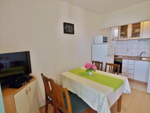 Kuchyň nebo kuchyňský kout v ubytování Apartments Fabijanić