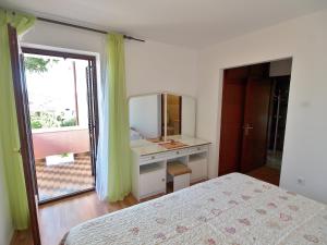 Kuchyň nebo kuchyňský kout v ubytování Apartments Fabijanić