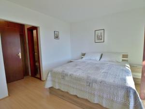 Postel nebo postele na pokoji v ubytování Apartments Fabijanić
