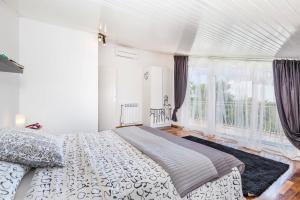 Postel nebo postele na pokoji v ubytování Villa Parenzana