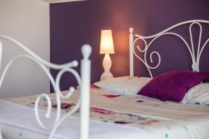 Postel nebo postele na pokoji v ubytování Villa Parenzana