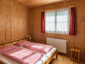 Postel nebo postele na pokoji v ubytování Ferienhaus Valleu