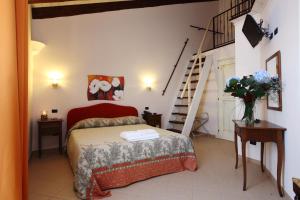 Giường trong phòng chung tại Il Casale Dei Ciliegi +15 ảnh