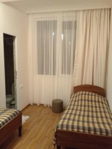 Кровать или кровати в номере Guest House 293