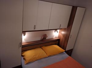Postel nebo postele na pokoji v ubytování Sakoman Apartments