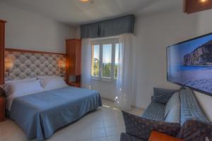 Кровать или кровати в номере Hotel Noris