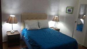 Postel nebo postele na pokoji v ubytování Hotel Náutico de Paita