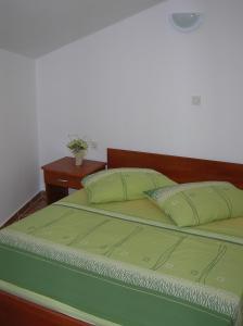 Giường trong phòng chung tại Apartment Jelena