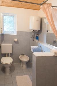 Koupelna v ubytování Apartments Lovor