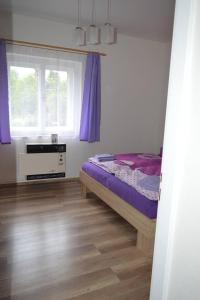 Postelja oz. postelje v sobi nastanitve U Lokálky