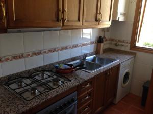 A kitchen or kitchenette at Vora Riu