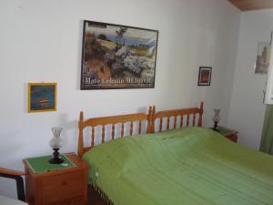 Postel nebo postele na pokoji v ubytování Apartments Lovor