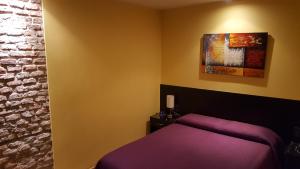 Postel nebo postele na pokoji v ubytování Sur Hotel