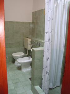Koupelna v ubytování Apartments Lovor