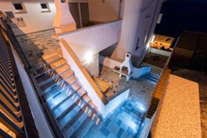 an overhead view of a staircase in a building at Apartments Maris Senj in Senj