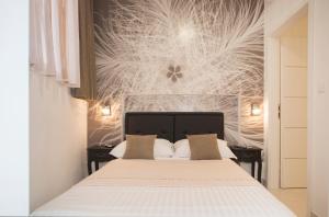 Voodi või voodid majutusasutuse Apartment & Room Split Lea toas