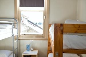 Postel nebo postele na pokoji v ubytování Delatite Hotel
