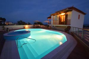 The swimming pool at or close to Driopes Villas