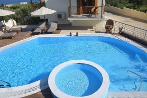 The swimming pool at or close to Driopes Villas