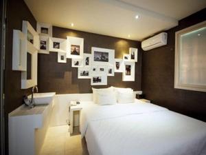 Postel nebo postele na pokoji v ubytování Hotel JUNE Haeundae