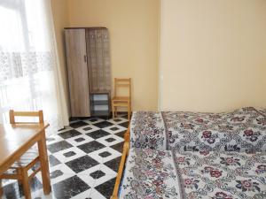 Postel nebo postele na pokoji v ubytování Guest House Nika
