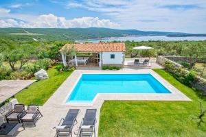 an image of a villa with a swimming pool at Salt & Sand Villa with a view in Kornić