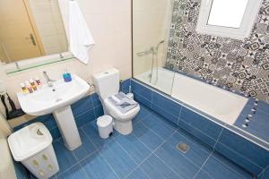 A bathroom at Villa Fantasia- Less than 5-Min Walk to Kalivaki Beach