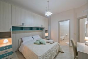 Postel nebo postele na pokoji v ubytování L'Incanto dei Monti