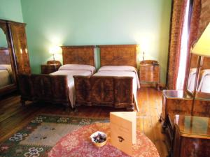 Postel nebo postele na pokoji v ubytování Hotel La Posada Regia