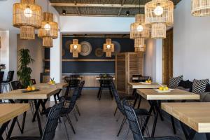 Um restaurante ou outro lugar para comer em My Mykonos Hotel