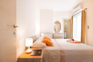 Posteľ alebo postele v izbe v ubytovaní Apartments Pina