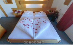 Postelja oz. postelje v sobi nastanitve Hotel Sonnenhof