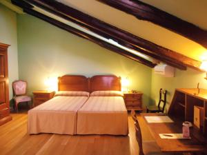 Postel nebo postele na pokoji v ubytování Hotel La Posada Regia