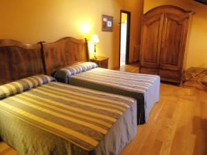 Postel nebo postele na pokoji v ubytování Hotel La Posada Regia