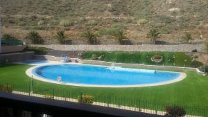 The swimming pool at or close to Apartment Jilguero Sunny