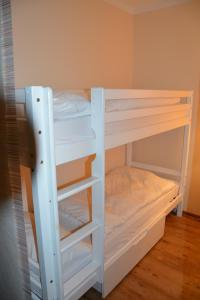Ein Bett oder Betten in einem Zimmer der Unterkunft Alpen Deluxe Oberammergau