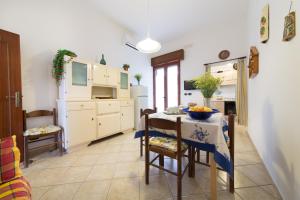 Kuchyň nebo kuchyňský kout v ubytování Casa Vacanze Maria + 12 fotografií