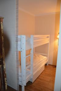 Ein Bett oder Betten in einem Zimmer der Unterkunft Alpen Deluxe Oberammergau