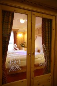 Postel nebo postele na pokoji v ubytování Hotel Bellavista