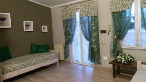 Ένα ή περισσότερα κρεβάτια σε δωμάτιο στο La Fontanella