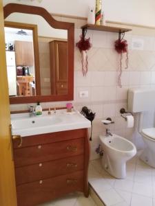 Kúpeľňa v ubytovaní Appartamento Brolo
